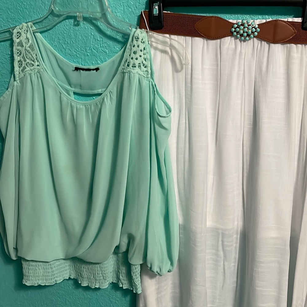 Mint green blouse and white skirt with a mint teal beaded belt.